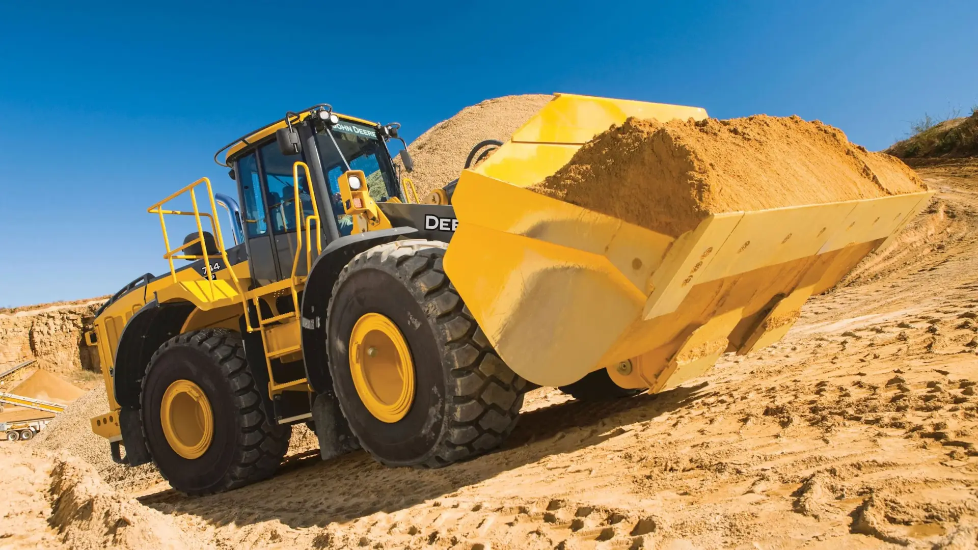 The SmartWeigh™ payload-weighing solution for mid-size and large John Deere wheel loaders allows operators to load accurately and without rework.